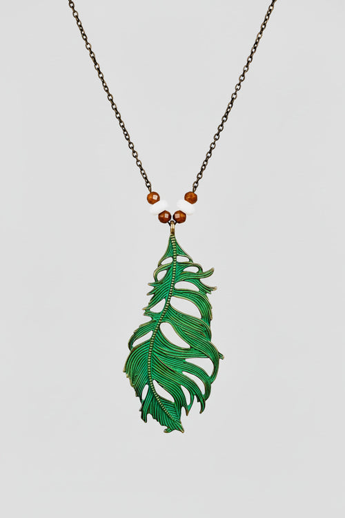 Feathers represent Strong, whatever you  are going through in life you may need this to remind.  42" chain with 2.5"  Green Feather pendant necklace . The Chain is unique bronze black sparkly  and dainty. 